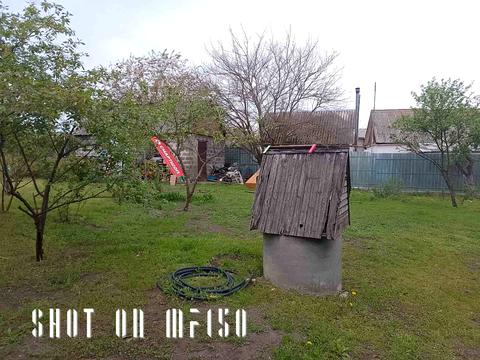 участок по адресу Мельниківська