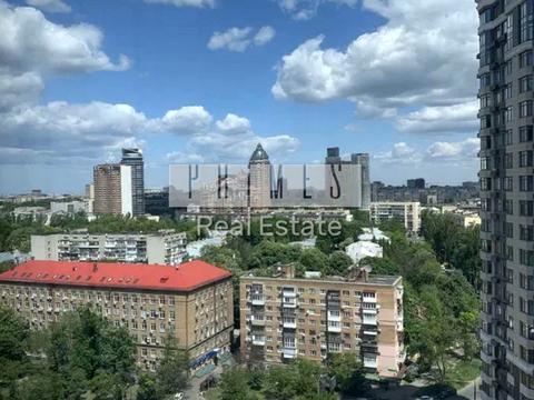 комерційна за адресою Євгена Коновальця вул. (Щорса), 32-А