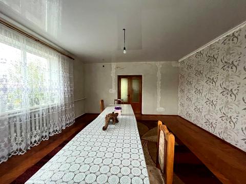 будинок за адресою Євгена Попова