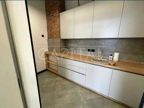 комерційна за адресою Євгена Коновальця вул. (Щорса), 44-А