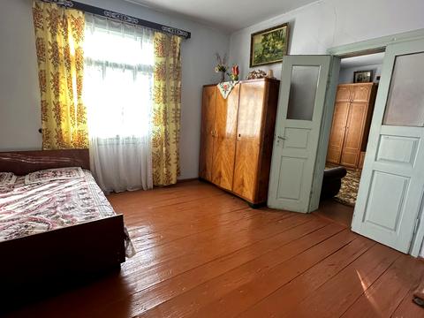 дом по адресу с. Плоская, провулок Луговий, 10