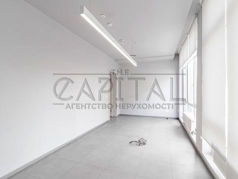 комерційна за адресою Спаська вул., 11