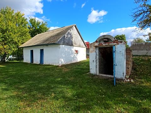 будинок за адресою с. Плужники, Червоноармійська