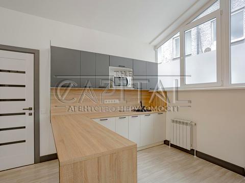 комерційна за адресою Куренівська вул., 21