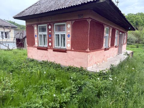 будинок за адресою с. Сімерки, Головна, 111