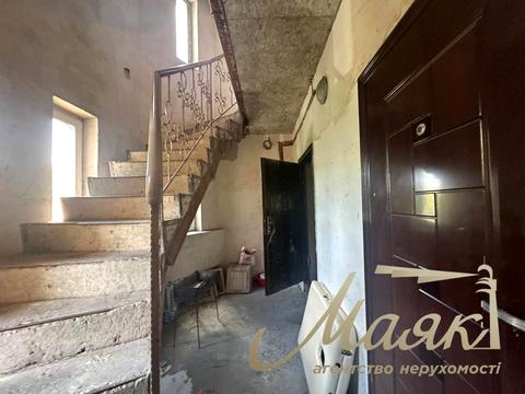 будинок за адресою Ольжича вул.