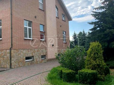 будинок за адресою смт. Козин, Лугова вул., 11
