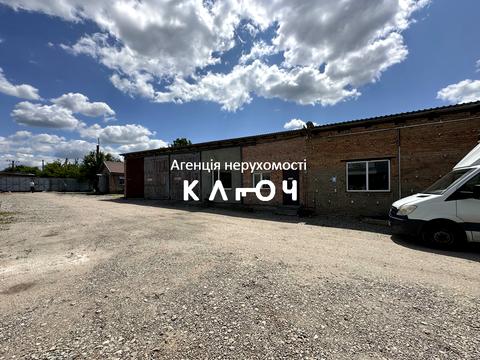 комерційна за адресою Олега Ольжича вул., 48А