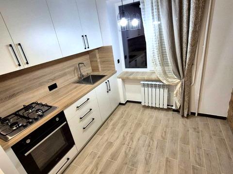 квартира по адресу Белая ул., 105