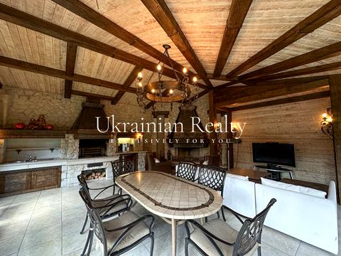 будинок за адресою смт. Козин, Андріївська, 31а