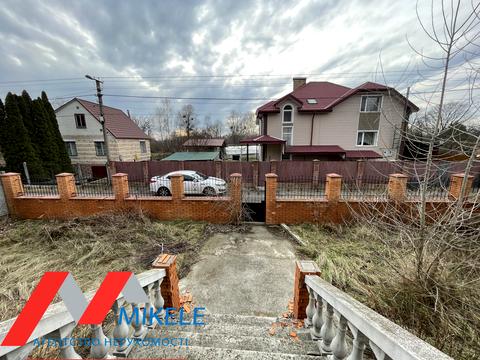 будинок за адресою смт. Козин, 2 лінія, 1