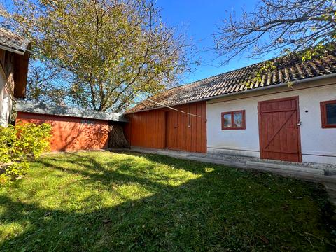 будинок за адресою с. Олеша, Грушевського