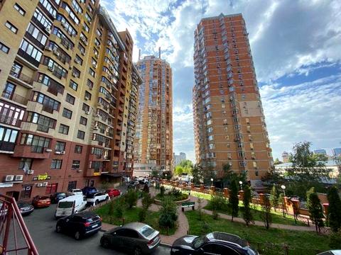 комерційна за адресою Євгена Коновальця вул. (Щорса), 32-Б