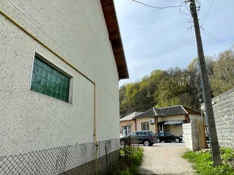 будинок за адресою Коновальця