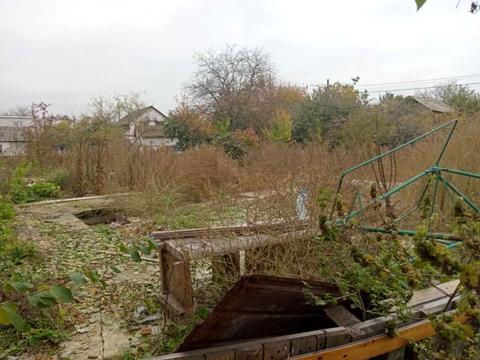 участок по адресу 75-а Садова