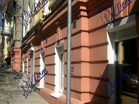 комерційна за адресою Куликівський узвіз (Революції), 13