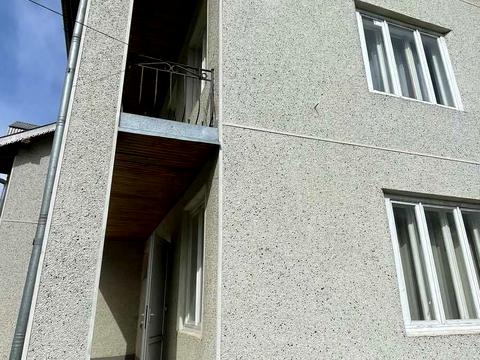 будинок за адресою Коновальця