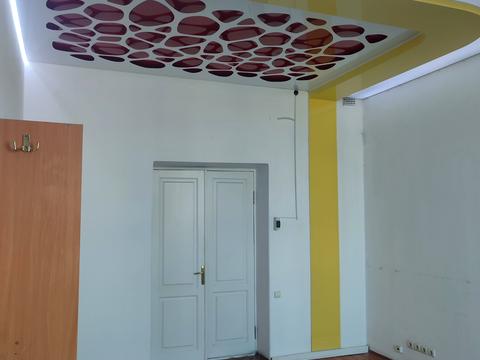 комерційна за адресою по Яворницького, 65