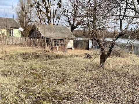 ділянка за адресою смт. Шарівка, Набережна
