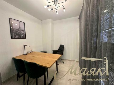 комерційна за адресою Джона Маккейна вул. (Івана Кудрі), 26