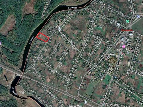 ділянка за адресою с. Орлівщина, Набережна Перемоги, 33