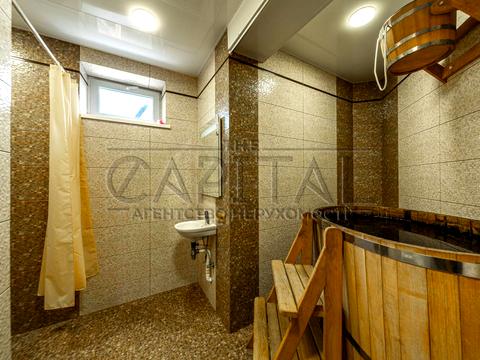 будинок за адресою с. Козин, Рудиківська