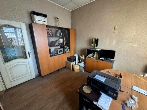 комерційна за адресою Шкільна вул., 1