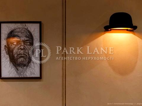 комерційна за адресою Євгена Коновальця вул. (Щорса), 12