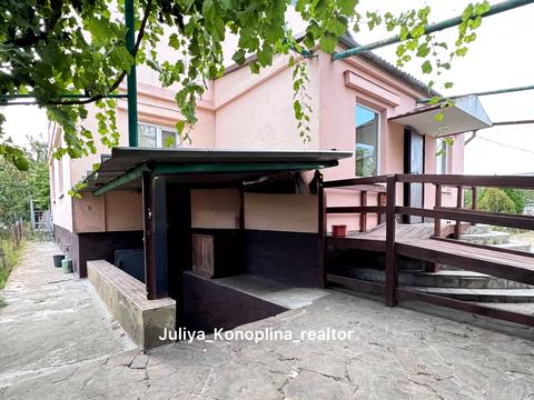 будинок за адресою Тополина
