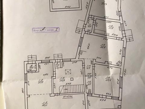 будинок за адресою Коновальця