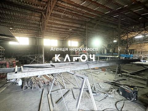 комерційна за адресою Олега Ольжича вул., 48А