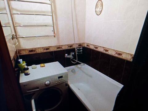 квартира по адресу Строителей ул., 12