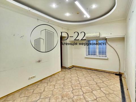 комерційна за адресою Миколи Міхновського бульв. (Дружби Народів), 13