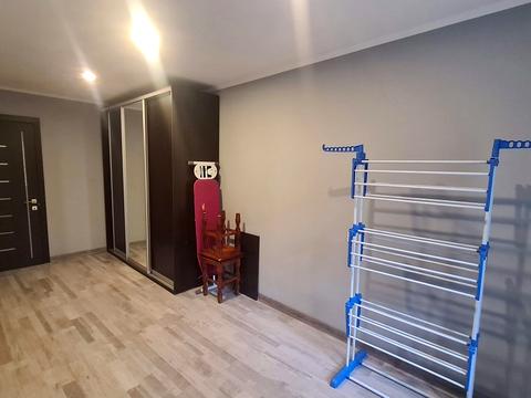 квартира по адресу Строителей ул., 12