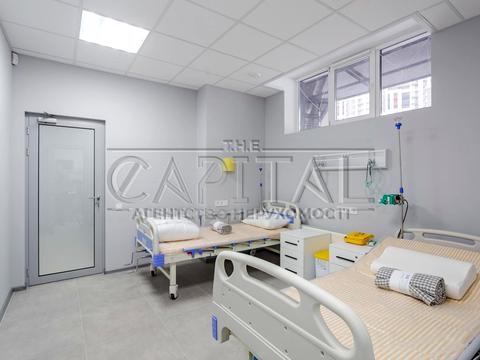комерційна за адресою Микільсько-Слобідська вул., 8