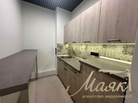 комерційна за адресою Джона Маккейна вул. (Івана Кудрі), 26