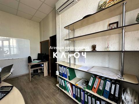 комерційна за адресою Олега Ольжича вул., 48А
