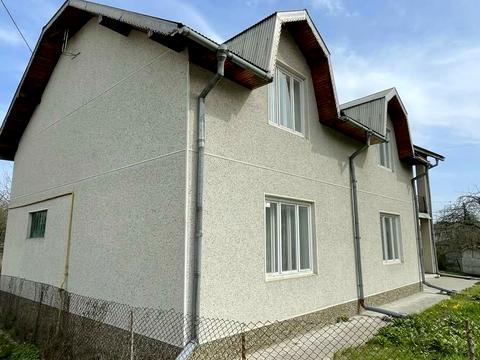 будинок за адресою Коновальця