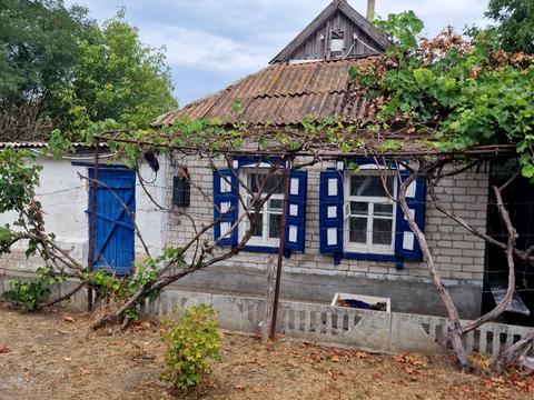 будинок за адресою с. Дніпровське, Козача