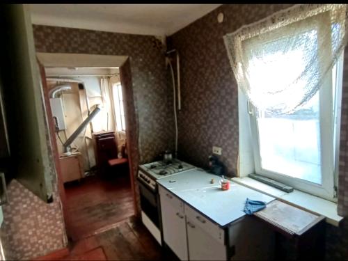 дом по адресу Воздвиженский спуск (Ватутіна)