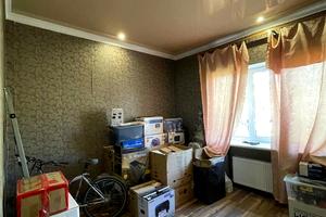будинок за адресою смт. Таїрове, Центральна