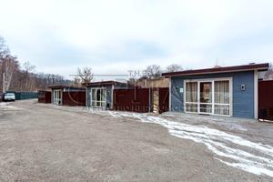 комерційна за адресою Шкільна вул., 1