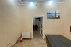 комерційна за адресою Базарна вул., 84