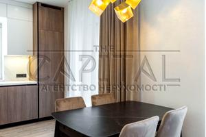 будинок за адресою с. Гатне, Жулянська вул., 2