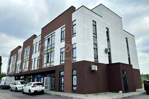 комерційна за адресою Братиславська вул., 52-Б