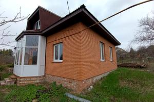 будинок за адресою смт. Високий, Кооперативна вул.