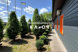 комерційна за адресою Олега Ольжича вул., 48А