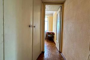 квартира по адресу Строителей ул., 12