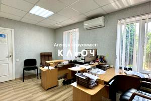 комерційна за адресою Олега Ольжича вул., 48А