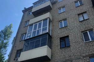 квартира за адресою Кооперативна вул., 18/20